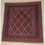 A red and blue ground Gazak rug with diamond field within multi-row borders 46" x 43"