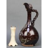 A 19th Century Continental slip glazed ewer with rope twist handle 14" and a Locke and Worcester
