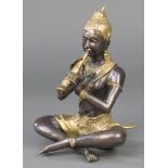 A Burmese gilt bronze figure of a seated musician 6"