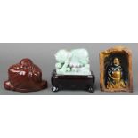 A carved hardstone figure of a seated Buddha 4" x 5 1/2" x 3", a rectangular carved hardstone