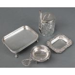 A silver plated rectangular card tray, a ditto dish , plated tea strainer and stand and a mounted