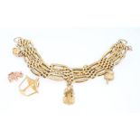 A 9ct yellow gold bracelet with charms, 20 grams