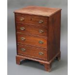 A 19th Century bleached mahogany chest of 4 long drawers with brass oval drop handles, raised on