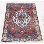 A red, blue and white ground Persian Bakhtiari rug with central medallion 79" x 54" The rug shows