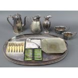 A silver plated coffee pot, an oval plated tray and minor plated items