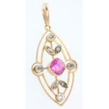 An Edwardian 14ct yellow gold diamond and ruby pendant