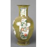 A Chinese 18th Century style green ground oviform vase decorated with vases 15"