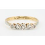 An 18ct yellow gold 5 stone diamond ring size N