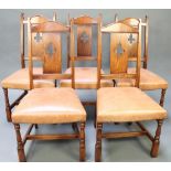 Brights of Nettlebed, a set of 6 carved oak slat and bar back dining chairs, the seats upholstered