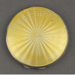 A silver and yellow guilloche enamel compact Birmingham 1940