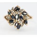 A 9ct yellow gold gem set ring size L