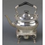 A Victorian silver tea kettle and stand with burner having demi-fluted decoration on scroll feet