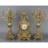 A Walt 20th Century clock garniture comprising striking mantel clock with enamelled dial contained