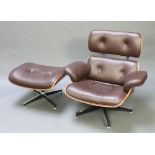 An Eames style armchair with rosewood finish and brown buttoned back hide, complete with matching