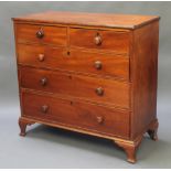 A Victorian mahogany chest of 2 short and 3 long drawers with ebony shield shaped escutcheons and