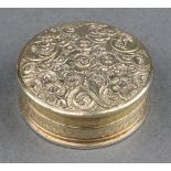 A George IV silver gilt circular pill box decorated with flowers Birmingham 1799 1 1/4", 10 grams