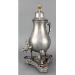 A pewter urn of baluster form raised on 3 cabriole supports together with turner and stand 15"