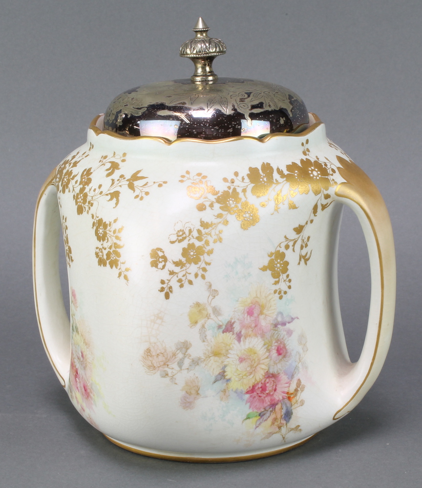 A Doulton Burslem biscuit barrel with gilt and polychrome floral decoration with plated lid