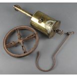 A John Linwood brass bottle jack complete with circular iron spit and hook