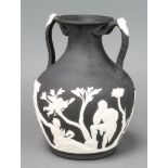 Portland Vase a black basalt 2 colour baluster vase with twin handles decorated with bearded