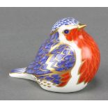 A Royal Crown Derby paperweight in the form of a robin with silver stopper 2 1/2"