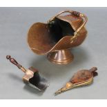 A Victorian copper shaped coal scuttle with associated shovel and a small pair of inlaid mahogany