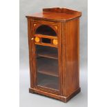 A Victorian inlaid rosewood music cabinet with raised back, fitted shelves enclosed by a glazed