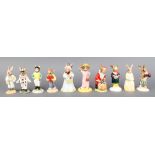 10 Royal Doulton Bunnykins figures - Sightseer DB215 4", Carol Singer DB104 4", Knockout DB30 4",