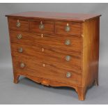 A Georgian mahogany chest of 3 short and 3 long drawers on splayed bracket feet with ivory diamond