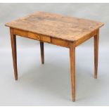 A French 18th Century elm and fruitwood side table the top formed of 3 planks, fitted a frieze