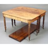 A George III mahogany extending dining table, raised on 8 spiral turned legs, complete with 3
