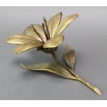 A gilt metal table ornament in the form of a lily 9" (1 stamen missing)