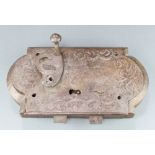 A 17th/18th Century Continental iron lock contained in a wooden mount 13" x 7" Some small holes