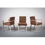 A SET OF TEN LIGNE ROSET DINING CHAIRS, CONTEMPORARY, in Alacantare Tabac and light oak, bearing