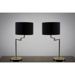 A PAIR OF BRASS TABLE LAMPS, 1970s with adjustable arms and circular bases, each 63cm (h)