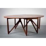 A FINE TEAK DINING TABLE, DANISH 1960s, BY KURT OSTERVIG, the oval drop leaf top on an angular