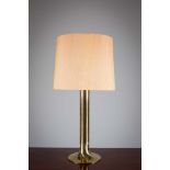 A LARGE GILT TABLE LAMP, BY HANS AGNE JACOBSEN, SWEDISH 1970s, 88cm (h), bearing makers label