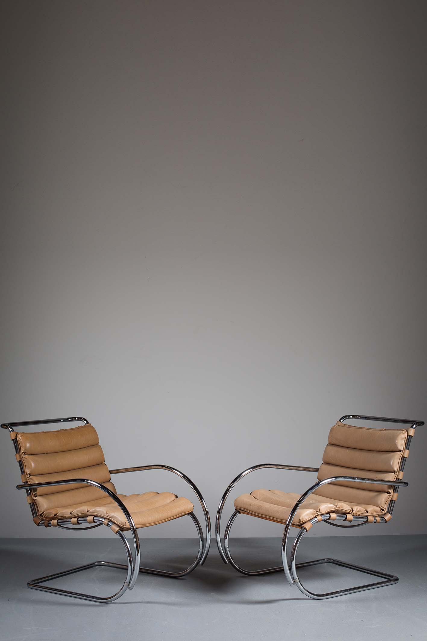 A PAIR OF MR CHAIRS, BY LUDWIG MIES VAN DER ROHE FOR KNOLL INTERNATIONAL, with original tanned