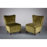 A PAIR OF UPHOLSTERED LOW CHAIRS, Italian 1960s, on short tapering legs.