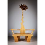 A HAND CARVED FLOWER CHAIR, IRISH, BY PAUL BERG, 215cm (h) x 132cm (w)