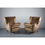 A PAIR OF ITALIAN WING BACK CHAIRS, 1960s, with shaped arms, on tapering legs
