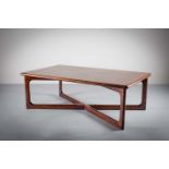 A RECTANGULAR ROSEWOOD COFFEE TABLE, DANISH, with crossover stretcher, 130cm (w) x 76cm (d) x 44.5cm
