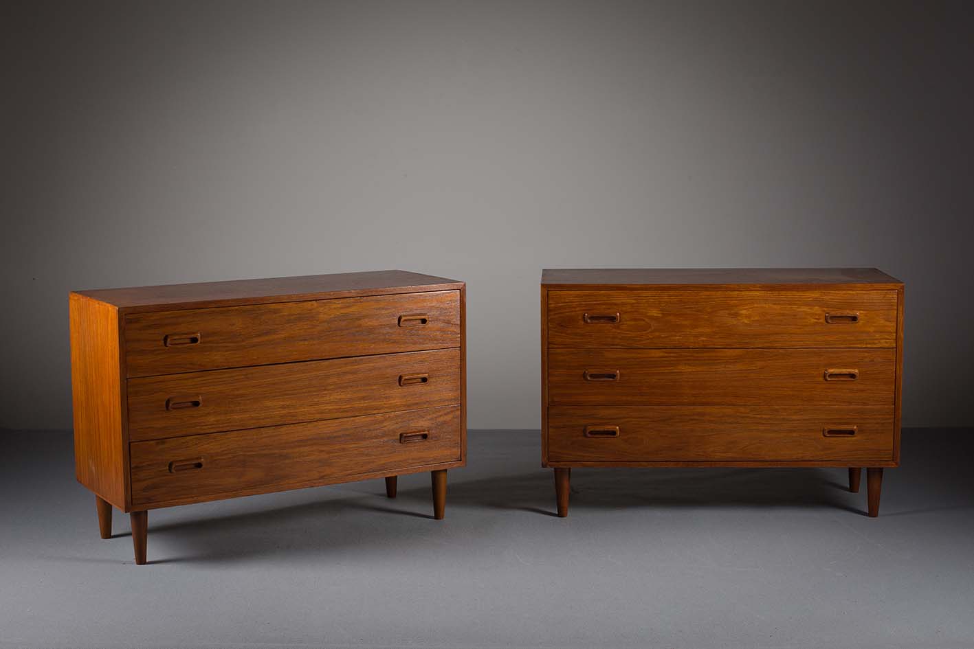 A PAIR OF TEAK CHEST OF DRAWERS, DANISH, comprising three drawers, on tapering legs, 110cm (w) x