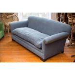 A HANDMADE THREE SEATER LE CANAPE SOFA, BY DU LONG & DU LE, upholstered in blue blue linen fabric,