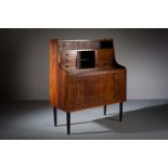 A ROSEWOOD DRESSING TABLE, DANISH 1960s, the galleried top containing pigeon holes and drawers