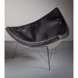 THE COCONUT CHAIR, BY GEORGE NELSON FOR VITRA, in black, on tubular tapering legs.