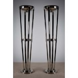 A PAIR OF CHROME ART DECO STYLE UPLIGHTERS, BY EICHOLTZ, on circular bases, each 202cm high