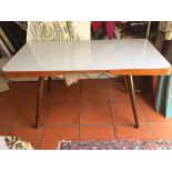 A FRENCH LOW TABLE, with laminate top on tapering legs, 110cm (w) x 55cm (d) x 61 cm (h)