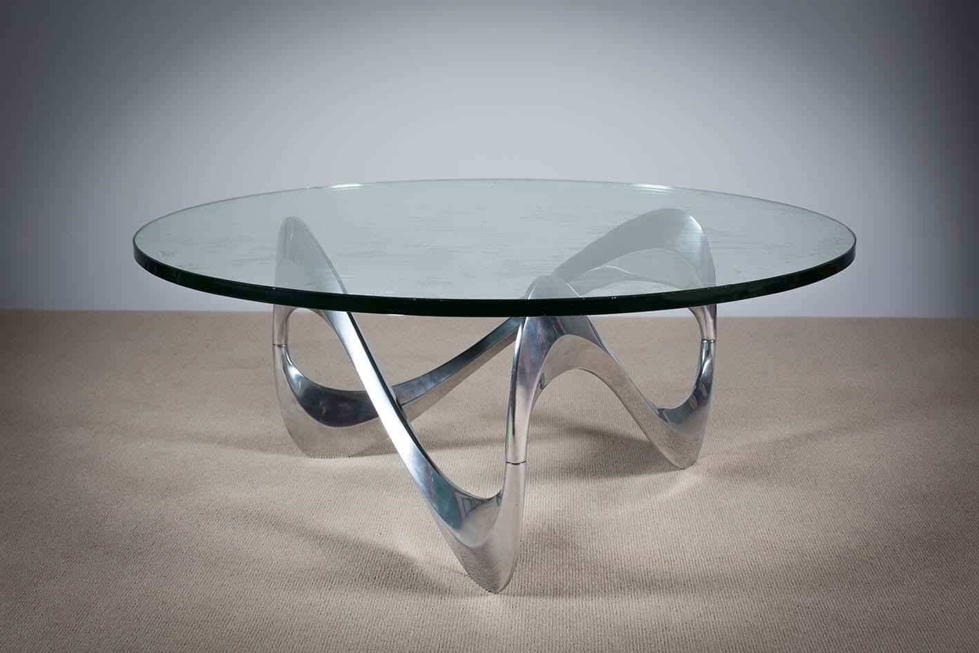 THE SNAKE TABLE BY KNUT HESTERBERG FOR RONALD SCHMITT, c.1965, on a shaped aluminium base 100cm (