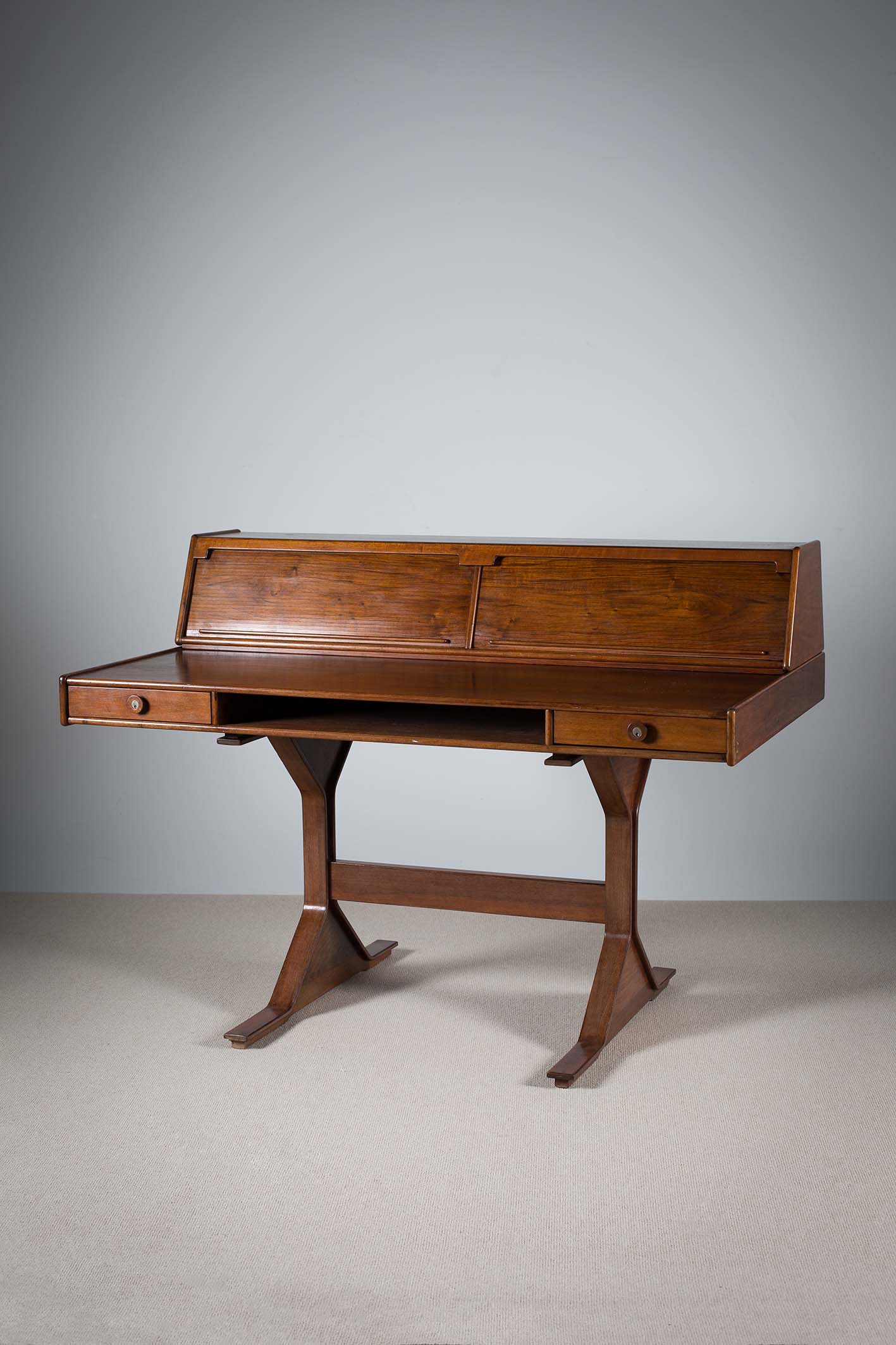 A ROSEWOOD DESK, BY GIANFRANCO FRATINI FOR BERNINI, ITALIAN, 1960s, by Bernini, Italian, 1960s,